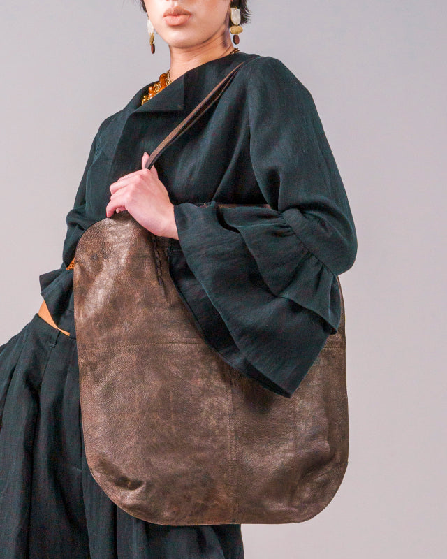 Mazonkiki handmade leather bags crafted by artisans in Hoi An Vietnam