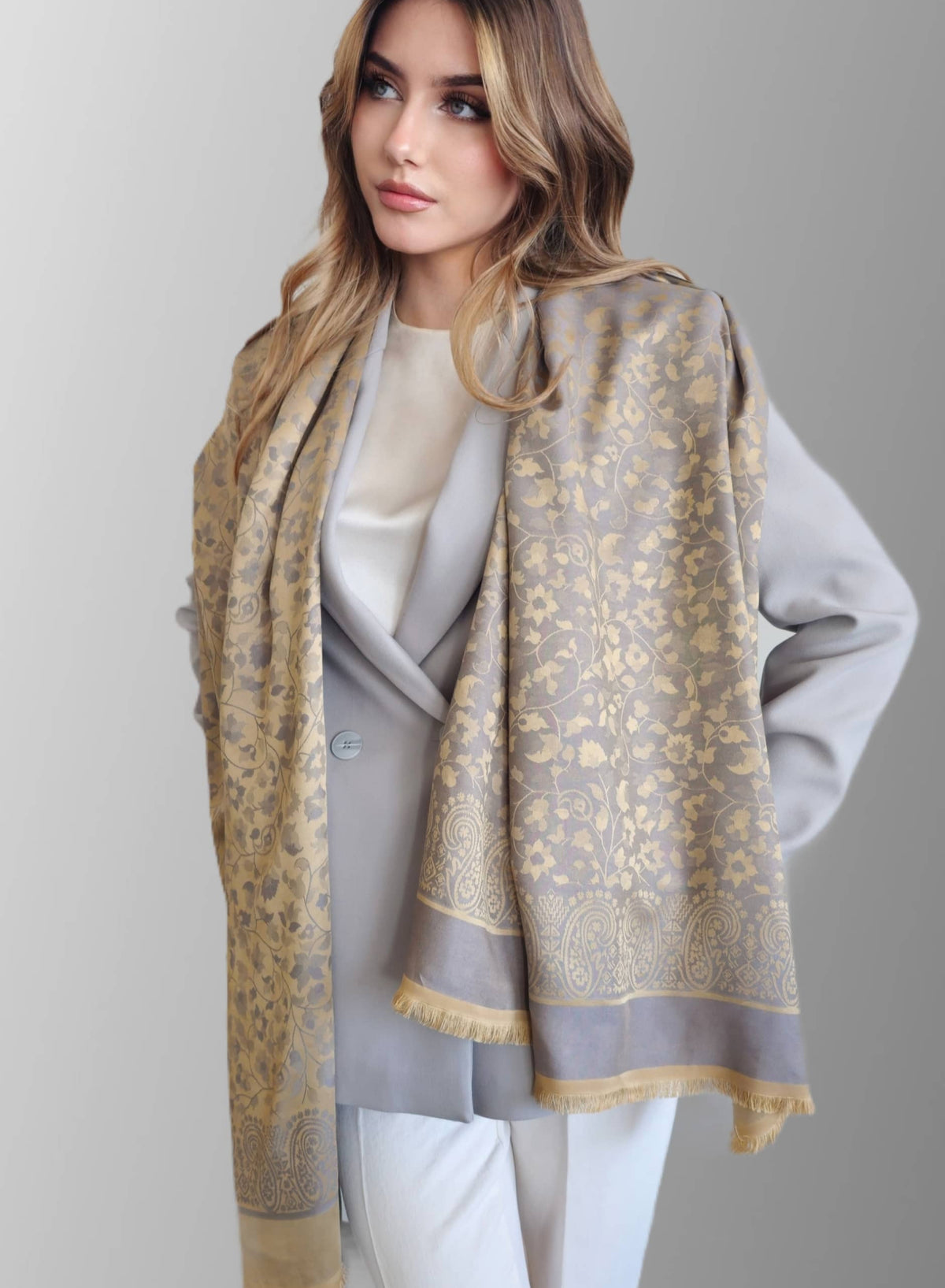 Model displaying grey and yellow 100% silk scarf by Mazonkiki