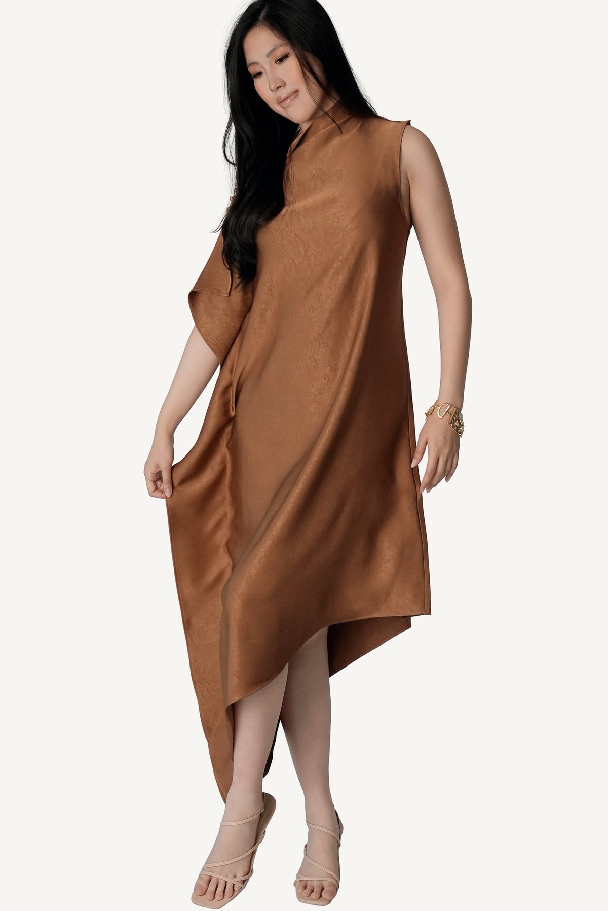 Rose-toned pearl button detail on Mazonkiki Caramel Fold tobacco satin asymmetric drape dress