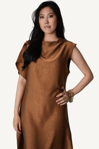 Tactile crinkled tobacco satin surface detail — Mazonkiki Caramel Fold asymmetric drape dress