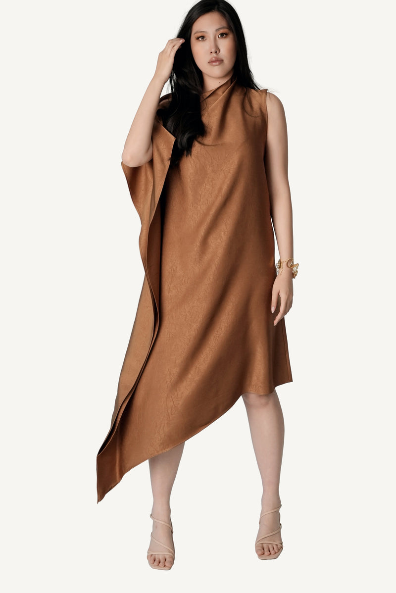 Mazonkiki Caramel Fold asymmetric drape dress in warm tobacco satin with rose-toned pearl buttons