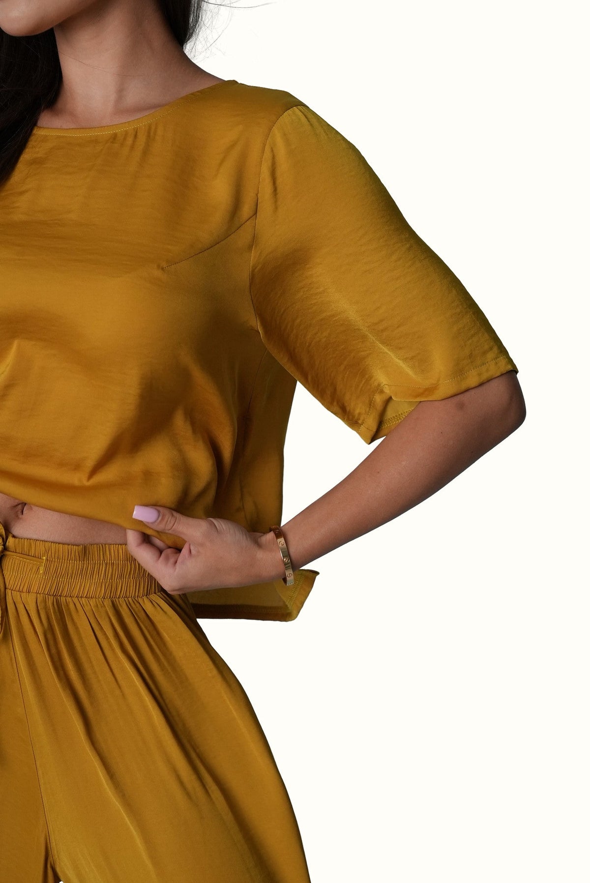 Mazonkiki Mustard Field set close-up — clean seam detailing on luxury mustard cropped tee