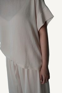 Pale Repose by Mazonkiki — ivory lounge co-ord with gently pooling wide-leg trousers and relaxed drape