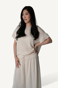 Mazonkiki Pale Repose wide-leg lounge set in ivory — unhurried silhouette shaped by quiet proportion