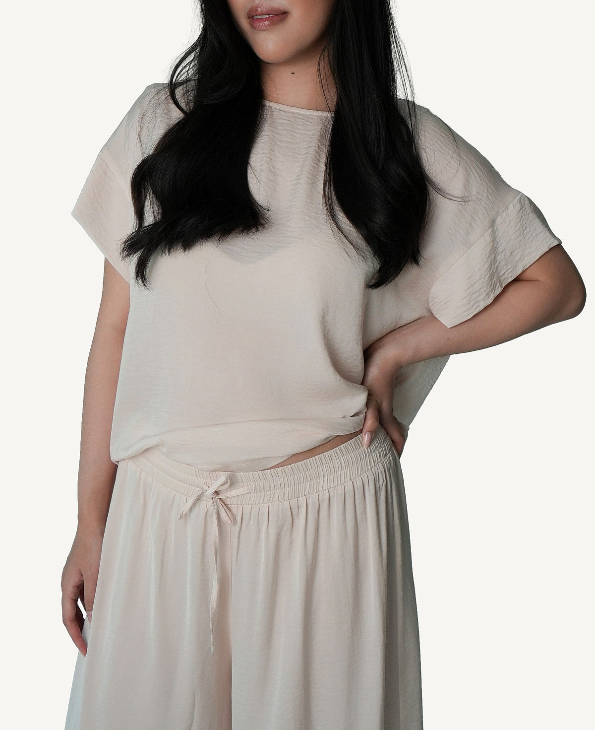 Mazonkiki Pale Repose soft ivory lounge set with draped cropped tee and fluid wide-leg trousers