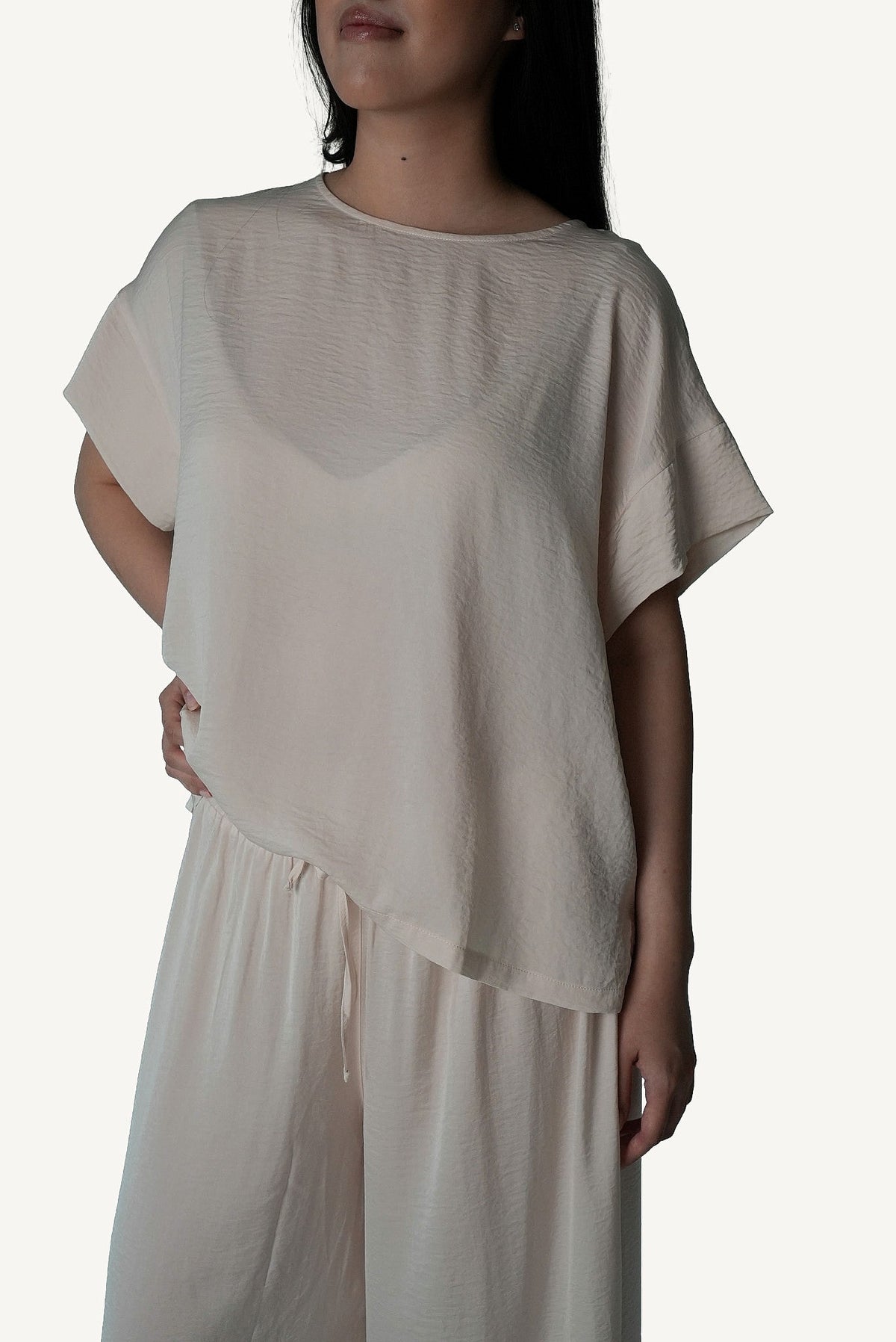 Mazonkiki Pale Repose lounge set side profile — ivory wide-leg trouser and relaxed draped cropped tee
